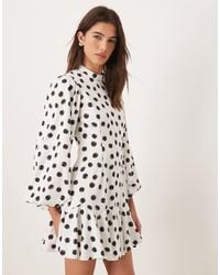 Sister Jane - Illume Exclusive High Neck Balloon Sleeve Ruffle Drop Hem Mini Dress - Lyst