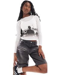 ASOS - T-shirt court double épaisseur en tulle à manches longues et motif photo - Lyst