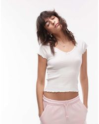 Tommy Hilfiger - Top Blanco Larga Con Bordes Ondulados De Canalé De - Lyst