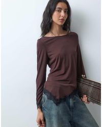 ONLY - Crew Neck Asymmetric Long Sleeve Top With Lace Hem - Lyst