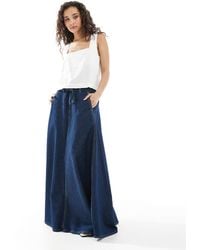 Levi's - Jupe mi-longue ample en jean - bleu foncé délavé - Lyst