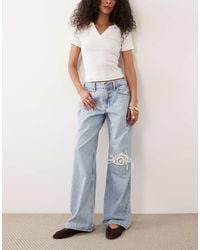 Abercrombie & Fitch - baggy Fit Low Rise Jeans With Crochet Rip Detail - Lyst