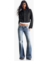 Bershka - Embroidered Low-rise Flared Jeans - Lyst