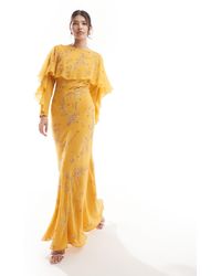 ASOS - Modesty - robe longue ornementée coupée en biais à manches longues et volants avec détail cape - moutarde - Lyst