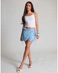 Missy Empire - Floral Sequin Side Wrap Tie Mini Skirt - Lyst