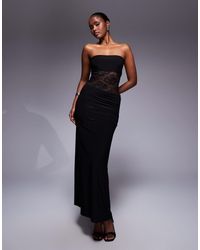 Kaiia - – exclusive – doppellagiges, figurbetontes, trägerloses maxikleid aus transparenter spitze - Lyst