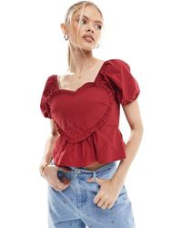 The Frolic - Exclusive Puff Sleeve Ruffle Heart Detail Peplum Crop Top Co-ord - Lyst