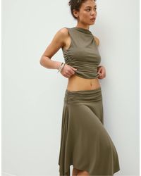 Stradivarius - – drapiertes, figurbetontes oberteil - Lyst