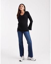 Mama.licious - Mamalicious Maternity Flared Jeans With Soft Over The Bump Band - Lyst