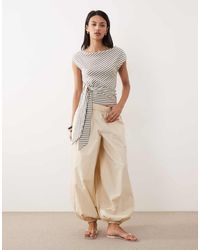 Gina Tricot - Asymmetric Shoulder Top With Tie Waist Detail - Lyst