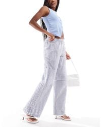 Pull&Bear - Pantalon large à carreaux vichy avec poches - Lyst