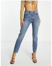 NA-KD - – schmale denim-jeans mit hoher taille - Lyst
