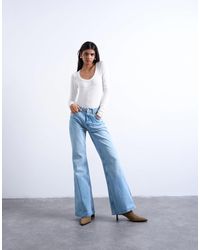 TOPSHOP - Pippa Mid Rise Comfort Stretch Flare Jean - Lyst