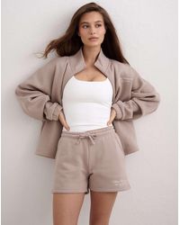 Aim'n - Short molletonné à inscription - argile foncé - Lyst