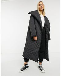 ASOS – Langer Mantel mit Rautensteppmuster - Schwarz