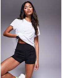 4505 - 3 Inch High Waist Running Shorts With Zip Phone Pocket - Lyst