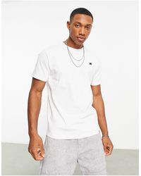New Balance - Camiseta blanca con logo pequeño - Lyst