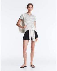 Oysho - Striped Comfortlux Short-Sleeved Polo Shirt - Lyst