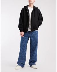 Tommy Hilfiger - Theo baggy Jeans With All Over Print - Lyst