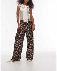 TOPSHOP - Pantalon plissé ample à pois - Lyst