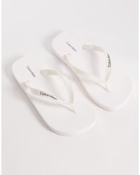 Calvin Klein - Jeans Metallic Flip Flops - Lyst