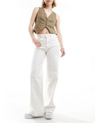 Pull&Bear - Jeans a vita alta e fondo ampio bianchi - Lyst