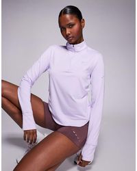 Nike - Swift Dri-fit Half Zip Long Sleeve Top - Lyst