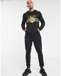ASOS Tracksuit With Hoodie And Skinny jogger With Amour Print - Black