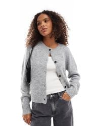 Vero Moda - Gilet à col rond en maille - clair chiné - Lyst