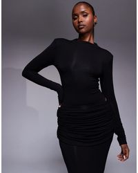 Wanderdoll - Ashtin - body d'ensemble à manches longues sculptant effet seconde peau avec encolure montante et épaulettes - Lyst
