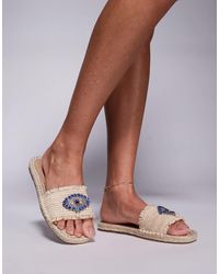 South Beach - – sandalen aus naturfarbenem raffiabast mit evil-eye-detail - Lyst