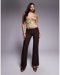 Tiger Mist - Kittie Low Waisted Tailored Button Detail Flared Trouser - Lyst