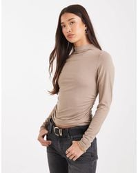 Levi's - Nina - t-shirt à manches longues et encolure montante - taupe - Lyst