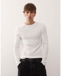 Collusion - Top henley à manches longues et boutonnage asymétrique - crème - Lyst