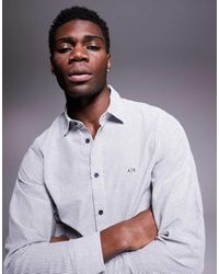 ARMANI EXCHANGE - Camicia Bianca E Blu A Righe Con Logo - Lyst