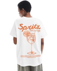 ASOS - T-shirt vestibilità classica bianca con stampa di spritz all'arancia - Lyst