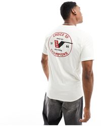 Vans - Camiseta blanco hueso con logo y estampado trasero choice of champions - Lyst
