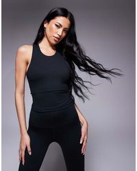 4505 - Icon Soft Touch Racer Back Vest With Inner Bra And Removable Padding - Lyst