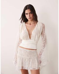 I.AM.GIA - Stevie Lace Plunge Neck Flared Sleeve Top - Lyst