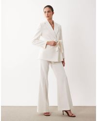 Mango - Iguana - pantalon d'ensemble ajusté et évasé - pastel - Lyst
