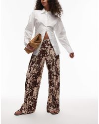 TOPSHOP - Abstract Animal Print Plisse Trousers - Lyst