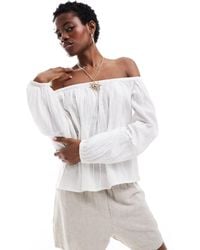 Monki - Off Shoulder Blouse With Pleated Bodice And Volume Sleeves - Lyst