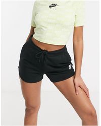 nike essentials shorts in yellow