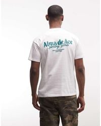 Alma de Ace - Sporting Goods Back Print Logo T-Shirt - Lyst