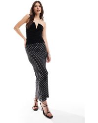 4th & Reckless - Jupe longue en satin à pois avec ourlet plongeant - noir - Lyst