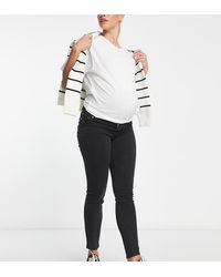 ASOS - Vaqueros De Corte Pitillo Con Lavado Negro Y Banda Por Encima Del Vientre Ultimate De Asos Design Maternity - Lyst