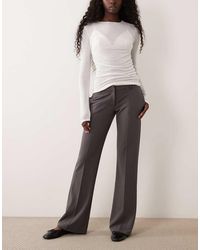 Gina Tricot - Low Waist Straight Leg Jersey Trousers - Lyst