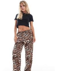 Vero Moda - Makkelijke Broek Met Wijde Pijpen En Gestrikte Taille - Lyst