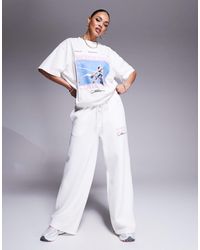 ASOS - Weekend collective – strukturierte, weit geschnittene jogginghose mit läufer-print, kombiteil - Lyst