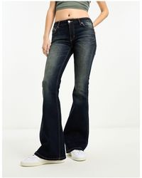 Weekday - Flame Low Waist Flared Jeans - Lyst